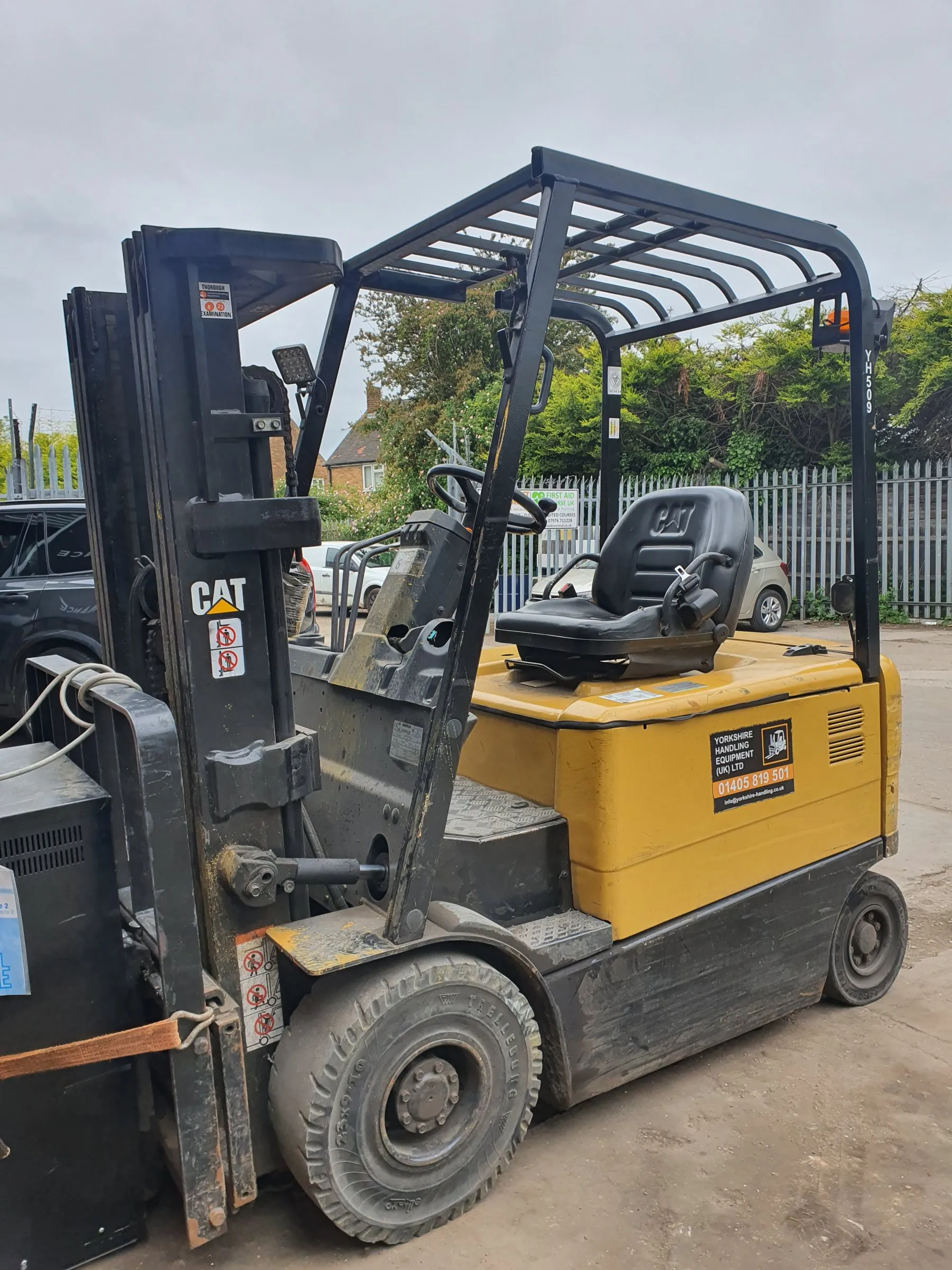 Yellow CAT electric counterbalance forklift outdoors