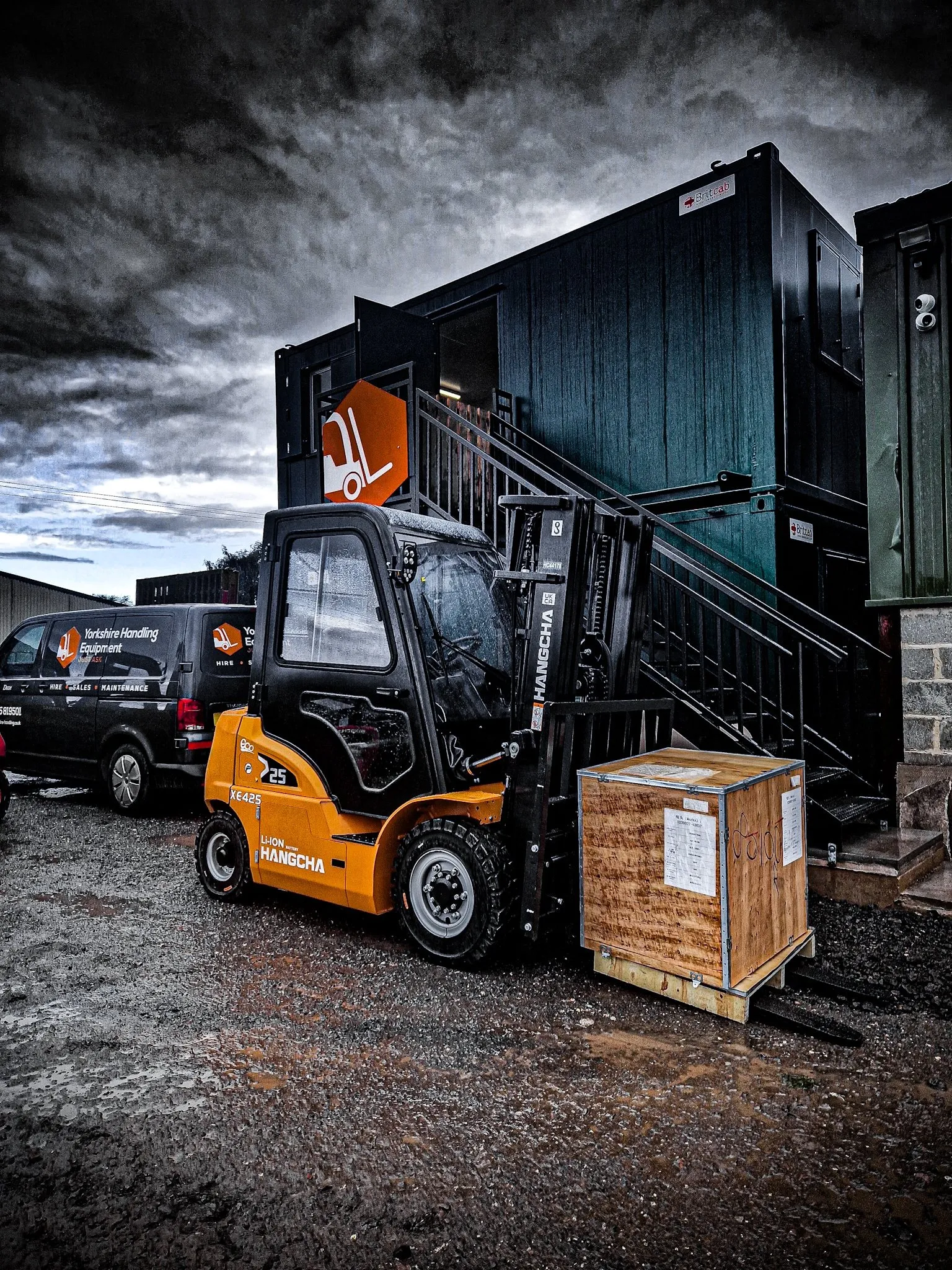 Orange Hangcha forklift and a branded van at the East Cowick yard